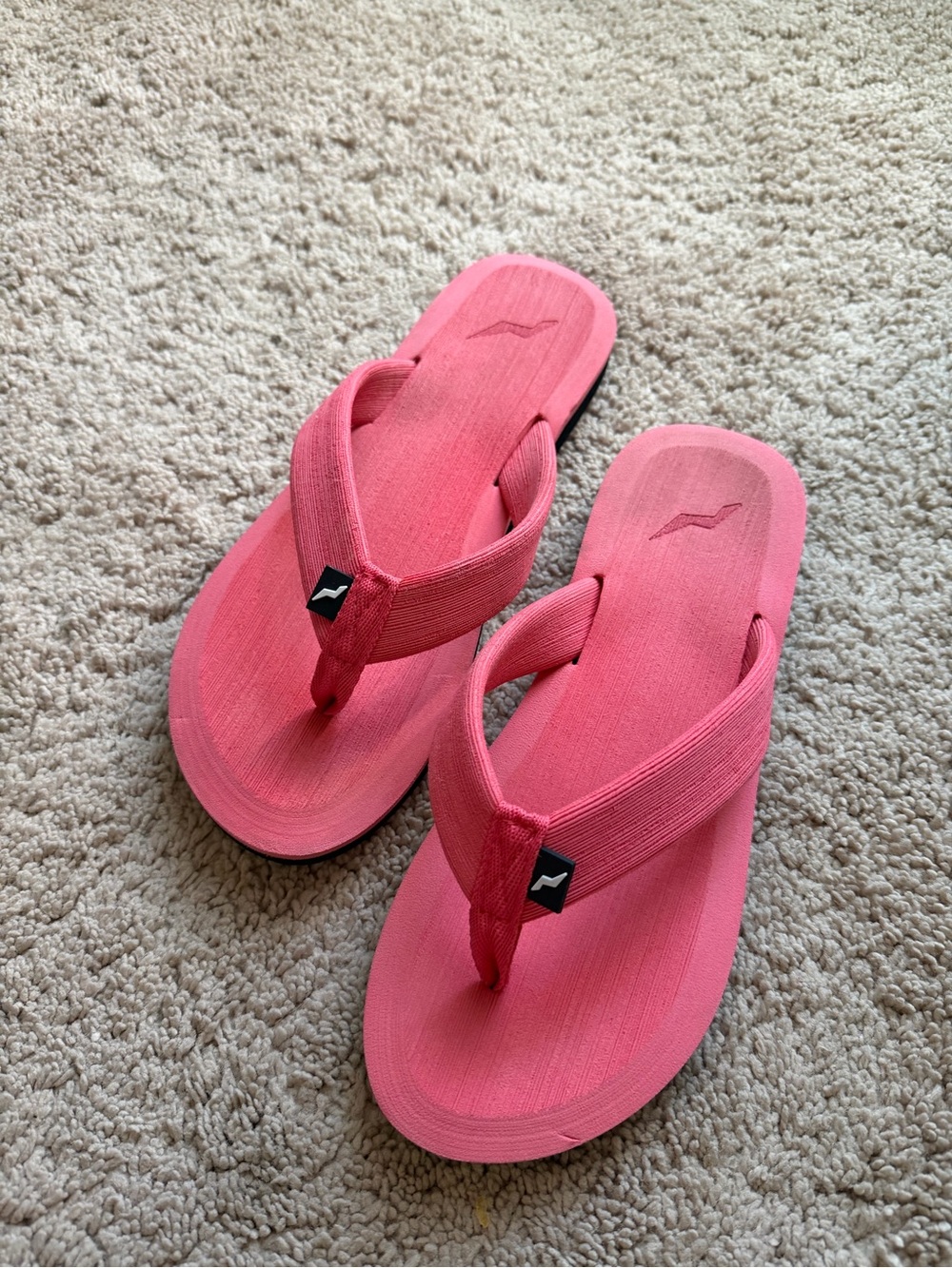 Pink Flip Flop Sandals with Wave Logo